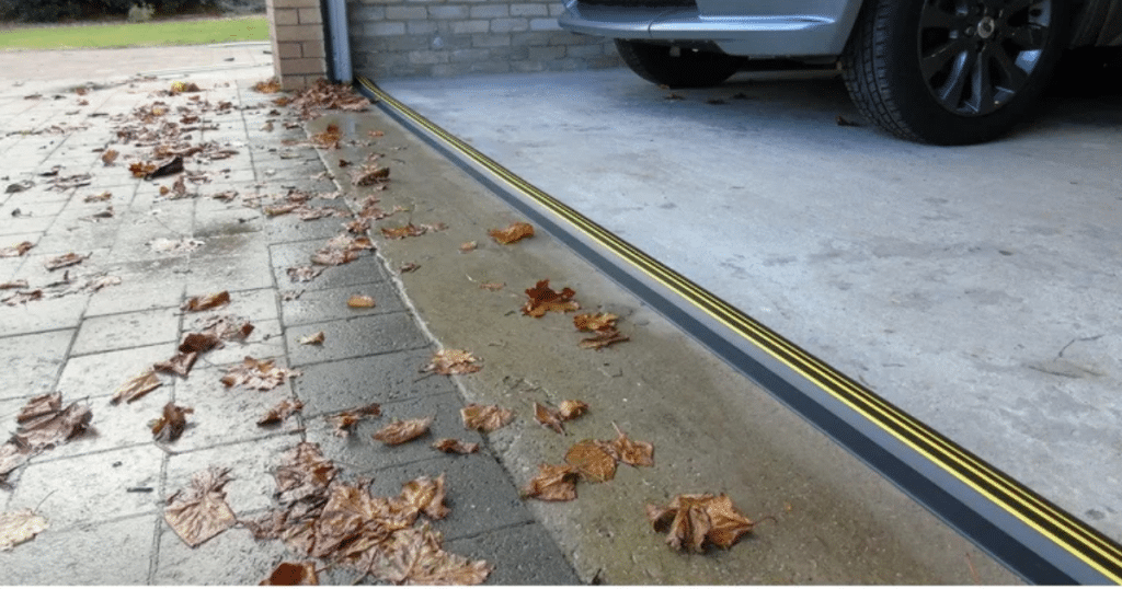 Garage seal blocks leaves from blowing inside.